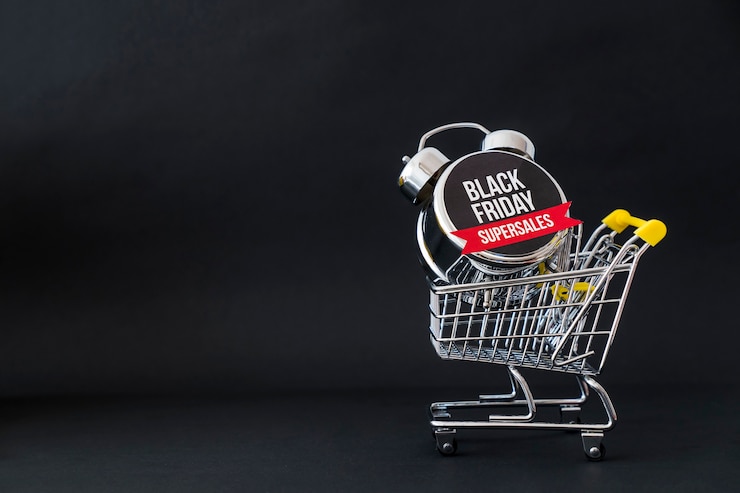 Foto gratuito concepto de black friday con despertador en carro y espacio