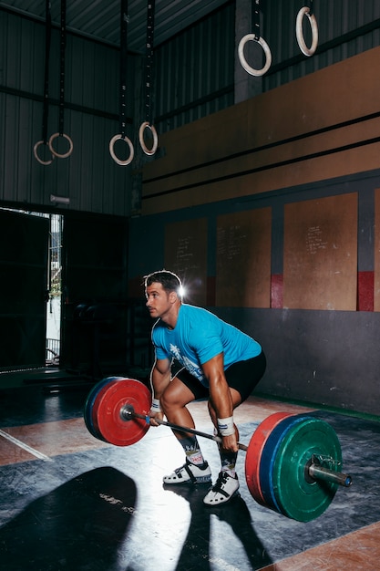 Concepto de gimnasio y barra de pesas