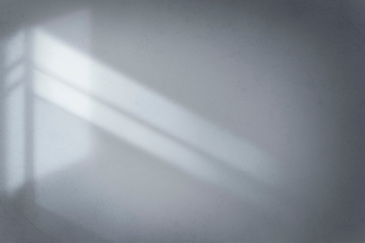 Concepto de luz de sombra de pared de cemento