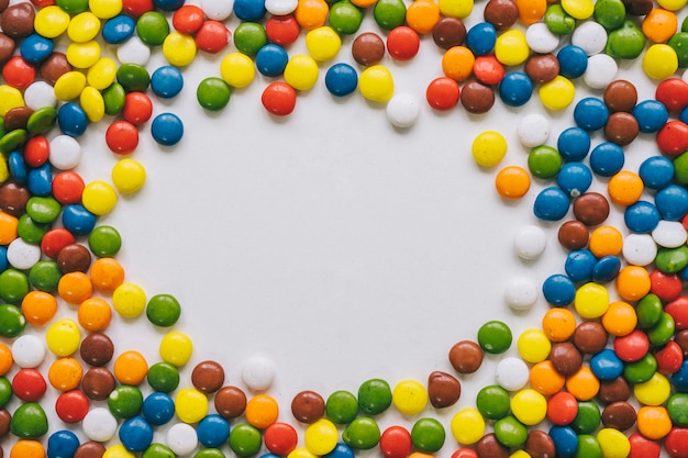Concepto de marco de caramelos coloridos