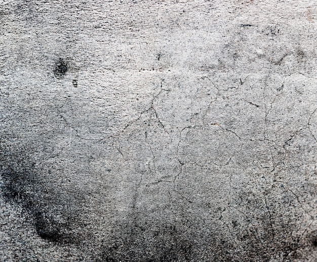 Concepto material de la textura del fondo del muro de cemento rasguñado