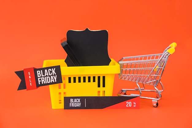 Foto gratuita concepto de rebajas de black friday con cesta