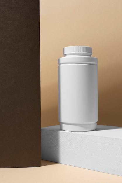 Foto gratuita contenedor de pastillas para estimular el cerebro vida muerta