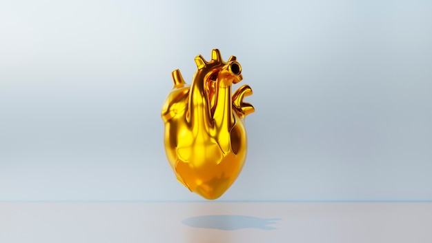 Corazón anatómico dorado con fondo azul.