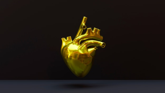 Corazón anatómico dorado