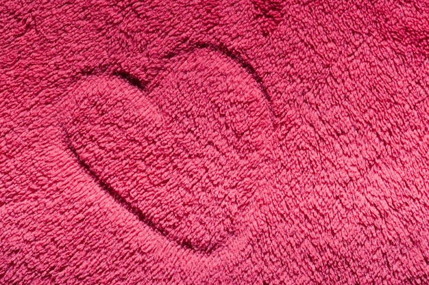 Corazón dibujado en alfombra