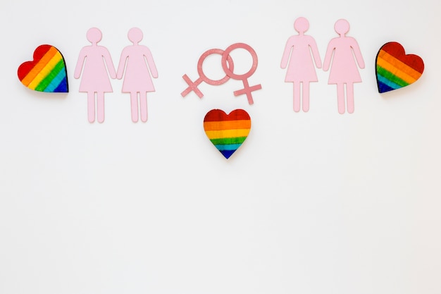 Corazones de arcoiris con parejas de lesbianas iconos