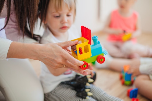 Cosecha de mujer con niños