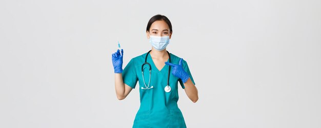 Covid coronavirus enfermedad trabajadores sanitarios concepto seguro amistoso aspecto médico mujer asiática p ...