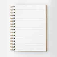 Foto gratuita cuaderno rayado en blanco sobre una mesa blanca