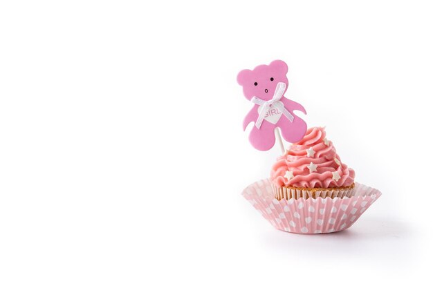 Cupcake rosa para baby shower aislado sobre fondo blanco.