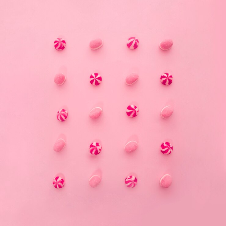 Foto gratuito decoración rosa de 20 caramelos