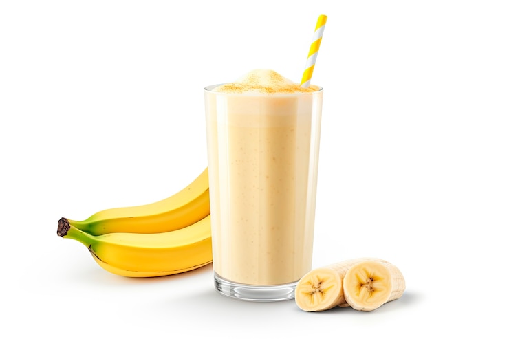 Foto gratuito un delicioso batido de plátano en la mesa.