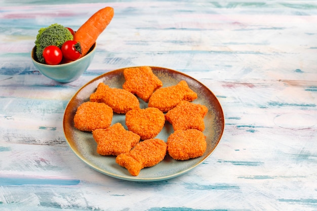 Foto gratuita deliciosos nuggets de pescado congelados.