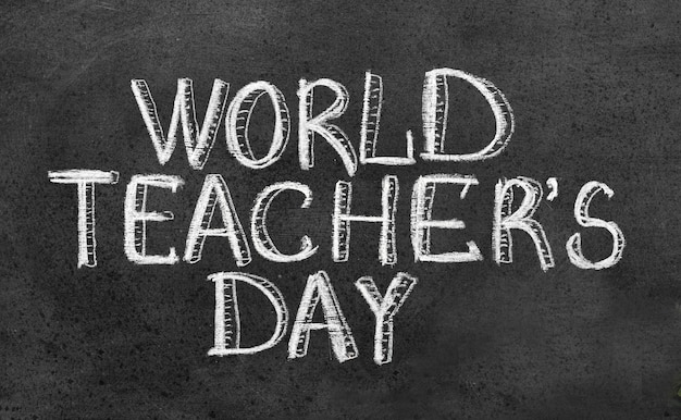 Día mundial del maestro en pizarra