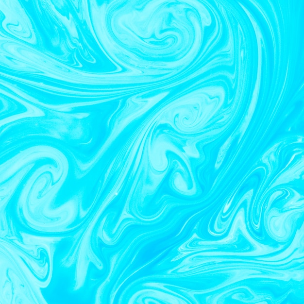 Dibujado a mano textura mezclada azul con pintura líquida