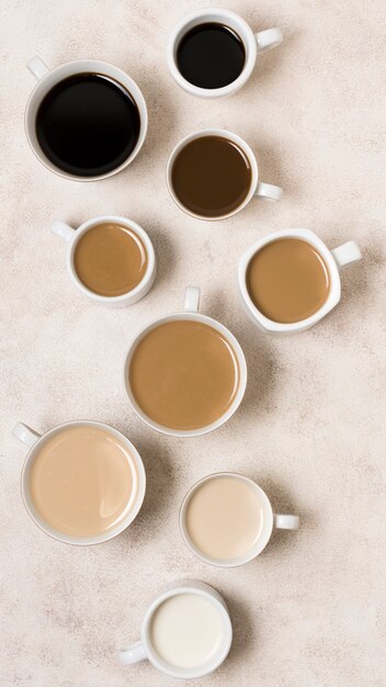Disposición de la vista superior de deliciosos tipos de café gradiente