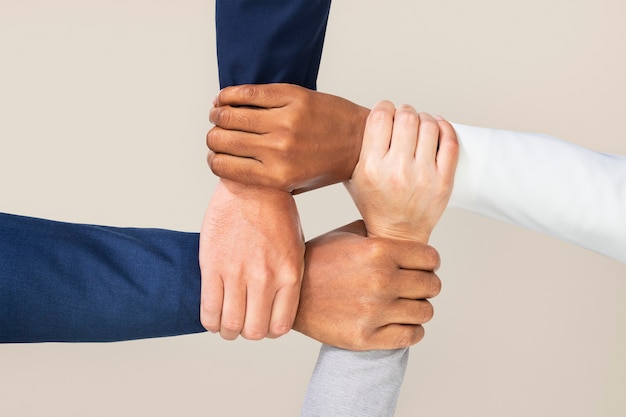 Diversas manos gesto de trabajo en equipo de negocios unidos