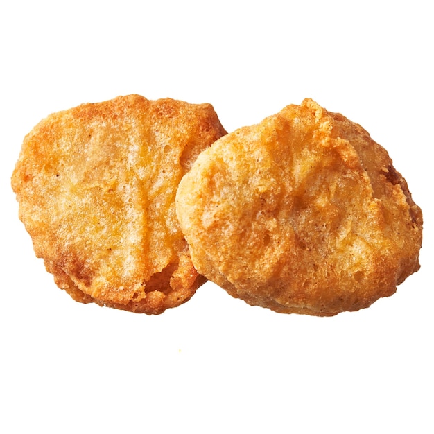 Foto gratuita dos nuggets de pollo aislado sobre un fondo blanco.