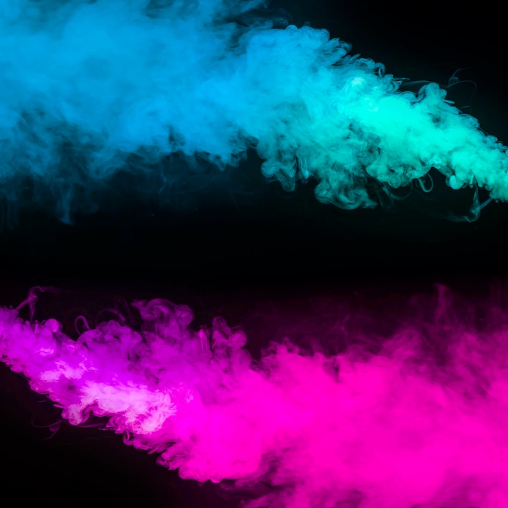 Foto gratuito efecto humo azul y rosa sobre fondo negro