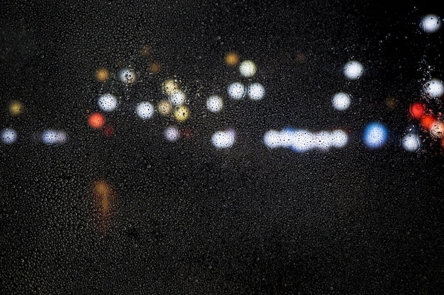 Efecto de lluvia sobre fondo de ciudad de noche