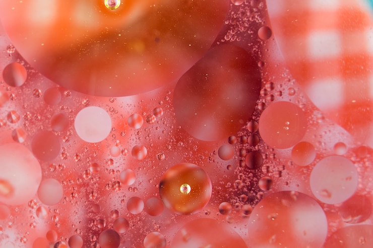 Foto gratuito efectos de burbujas sobre fondo rojo