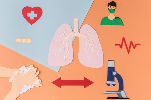 Foto gratuita elementos de salud y prevención del coronavirus en papel