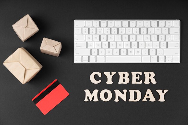 Elementos de venta de cyber monday de vista superior sobre fondo negro