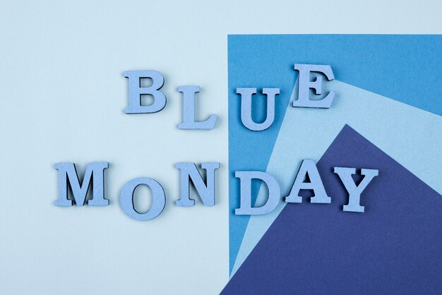 Endecha plana de papel de lunes azul