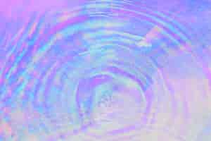 Foto gratuita espacio de diseño de fondo de ondulación de agua púrpura holográfica
