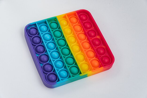 Fidget pop it toy rainbow color - antiestrés, divertido y educativo