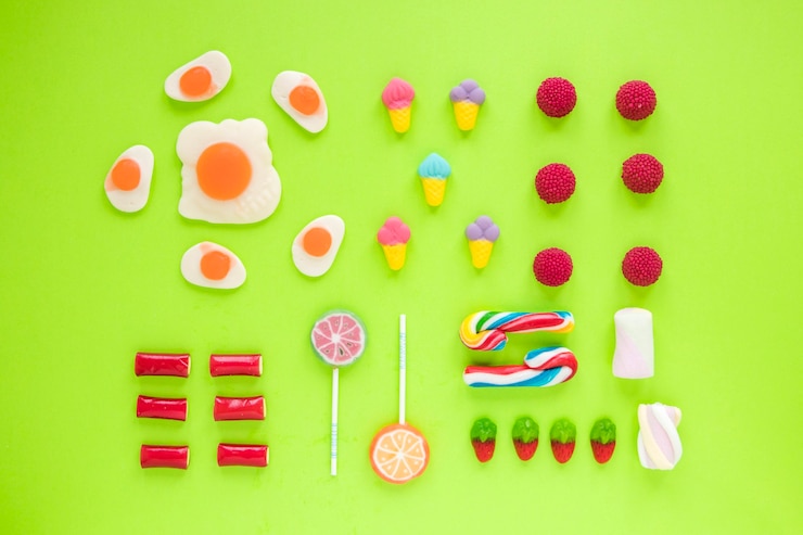 Foto gratuito filas de varios dulces