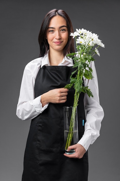 Floristería retrato mujer con flores