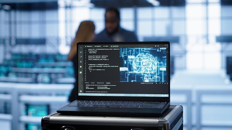 Photo Gratis focus on notebook used by engineers in server hub in blurry background