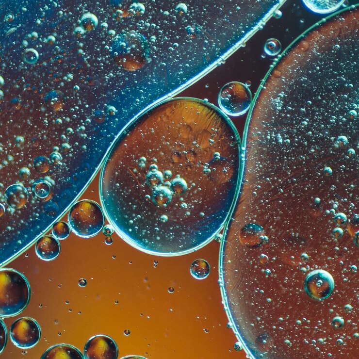 Foto gratuito fondo abstracto azul marino y naranja con burbujas