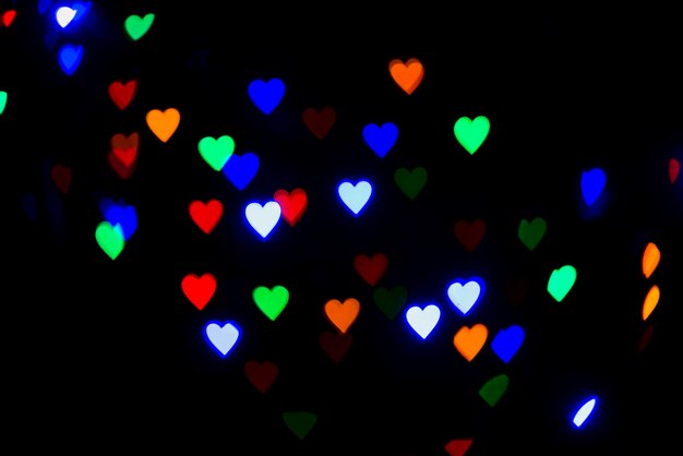 Fondo abstracto bokeh con luces en forma de corazón