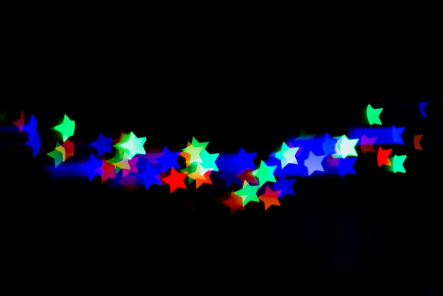 Fondo abstracto bokeh con luces en forma de estrellas