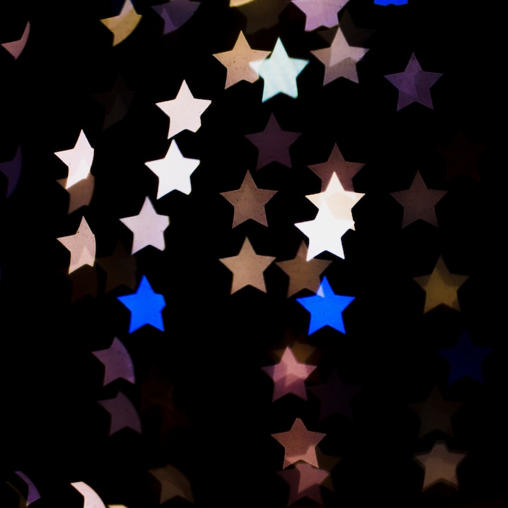 Foto gratuito fondo abstracto bokeh con luces en forma de estrellas
