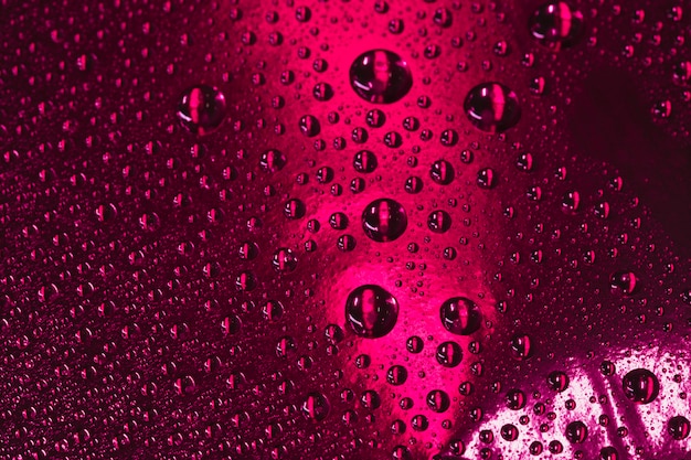 Fondo abstracto de Borgoña con gotas de agua