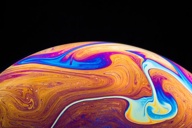 Fondo abstracto con esfera naranja y púrpura brillante