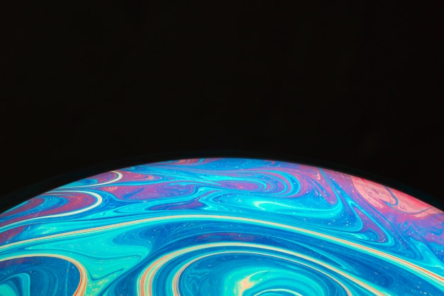 Fondo abstracto con esfera rosa y azul brillante