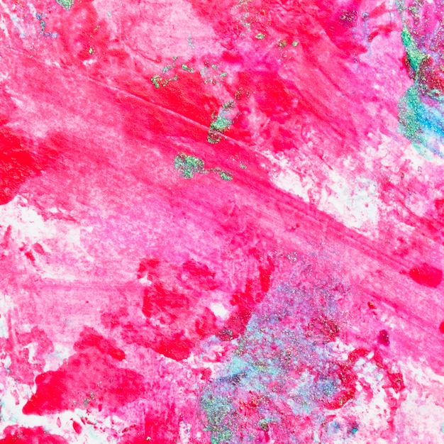 Fondo abstracto del esmalte de uñas rosa con salpicaduras