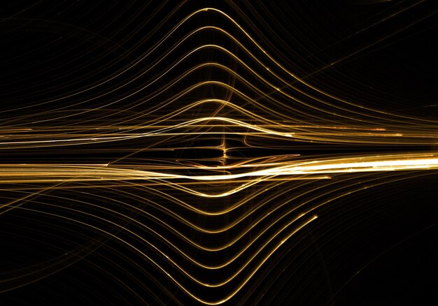 Foto gratuita fondo abstracto de ondas de líneas doradas