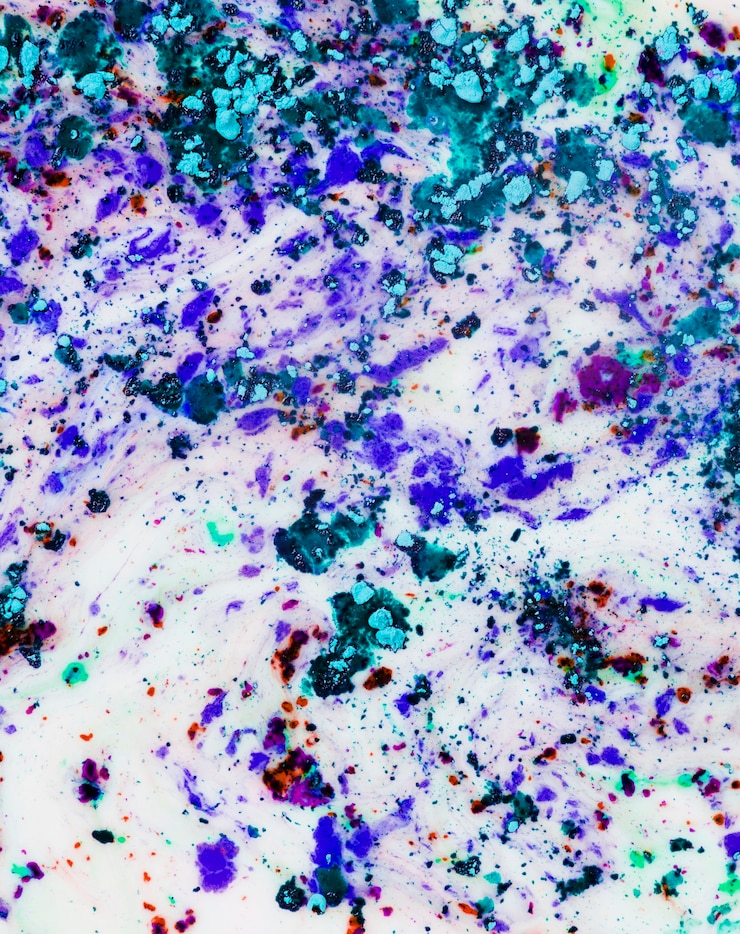 Foto gratuito fondo abstracto de polvo de color holi mezclado en líquido