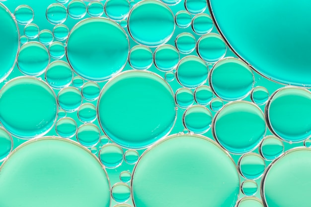 Fondo abstracto verde turquesa con burbujas