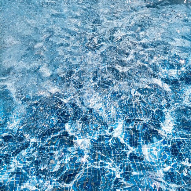 Fondo de agua de piscina de verano