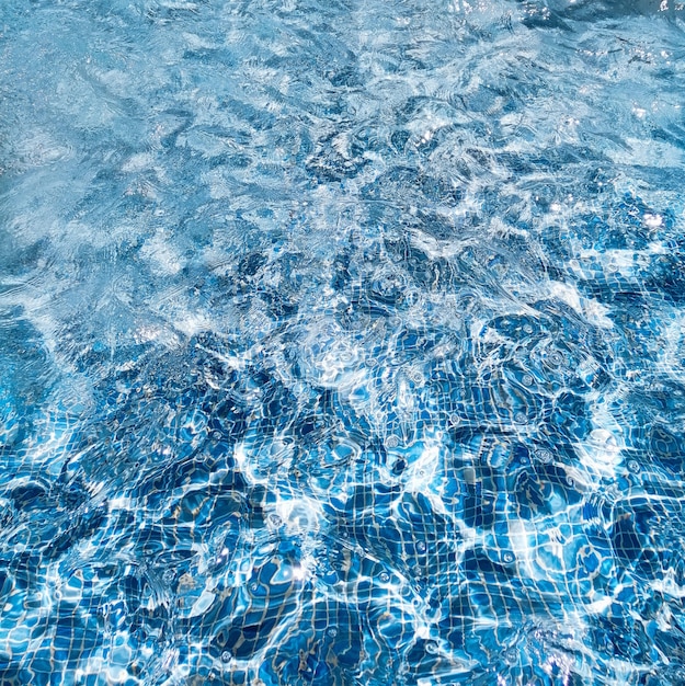 Fondo de agua de piscina de verano