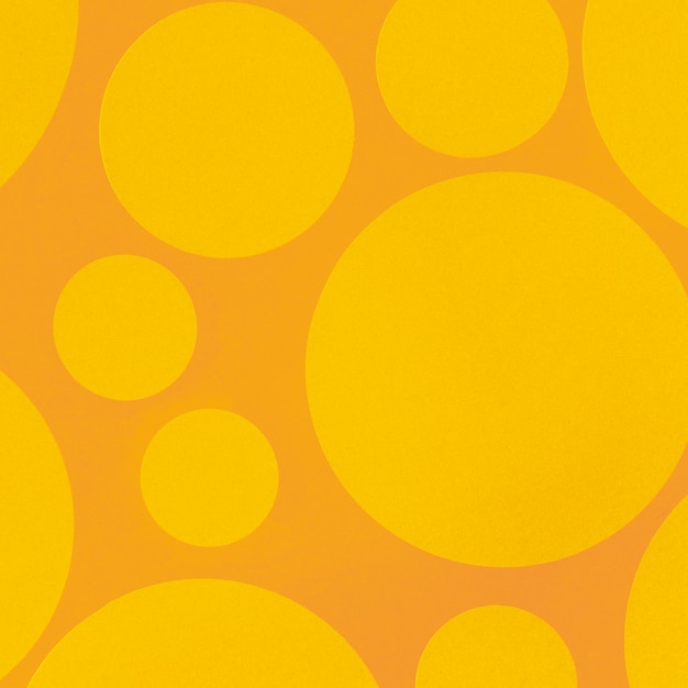 Fondo amarillo abstracto con elementos circulares