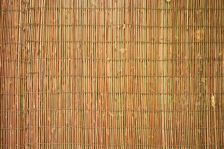Foto gratuito fondo amarillo de mimbre macro modelo