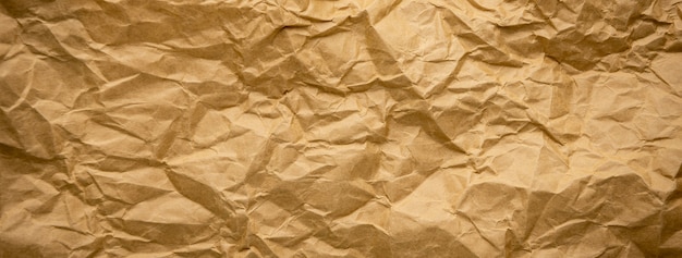 Fondo arrugado arrugado de la bandera de la textura del papel de kraft marrón Foto Premium 